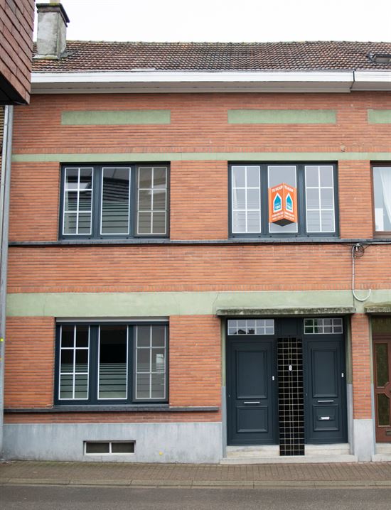 Huis met tuin, kelder en zolder