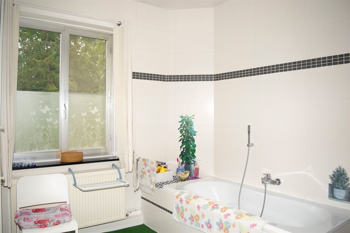 Huis met tuin, kelder en zolder