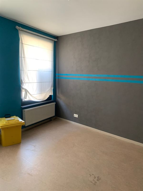 Gelijkvloers appartement met carport en terras