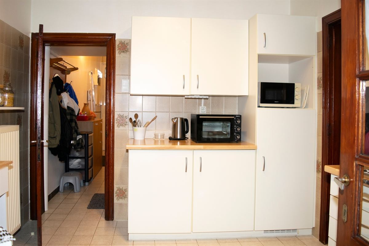 Huis met tuin, kelder en zolder
