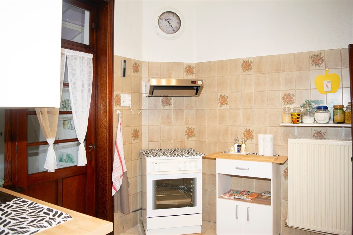 Huis met tuin, kelder en zolder