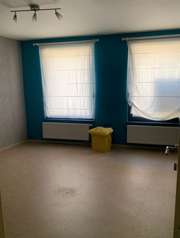 Gelijkvloers appartement met carport en terras