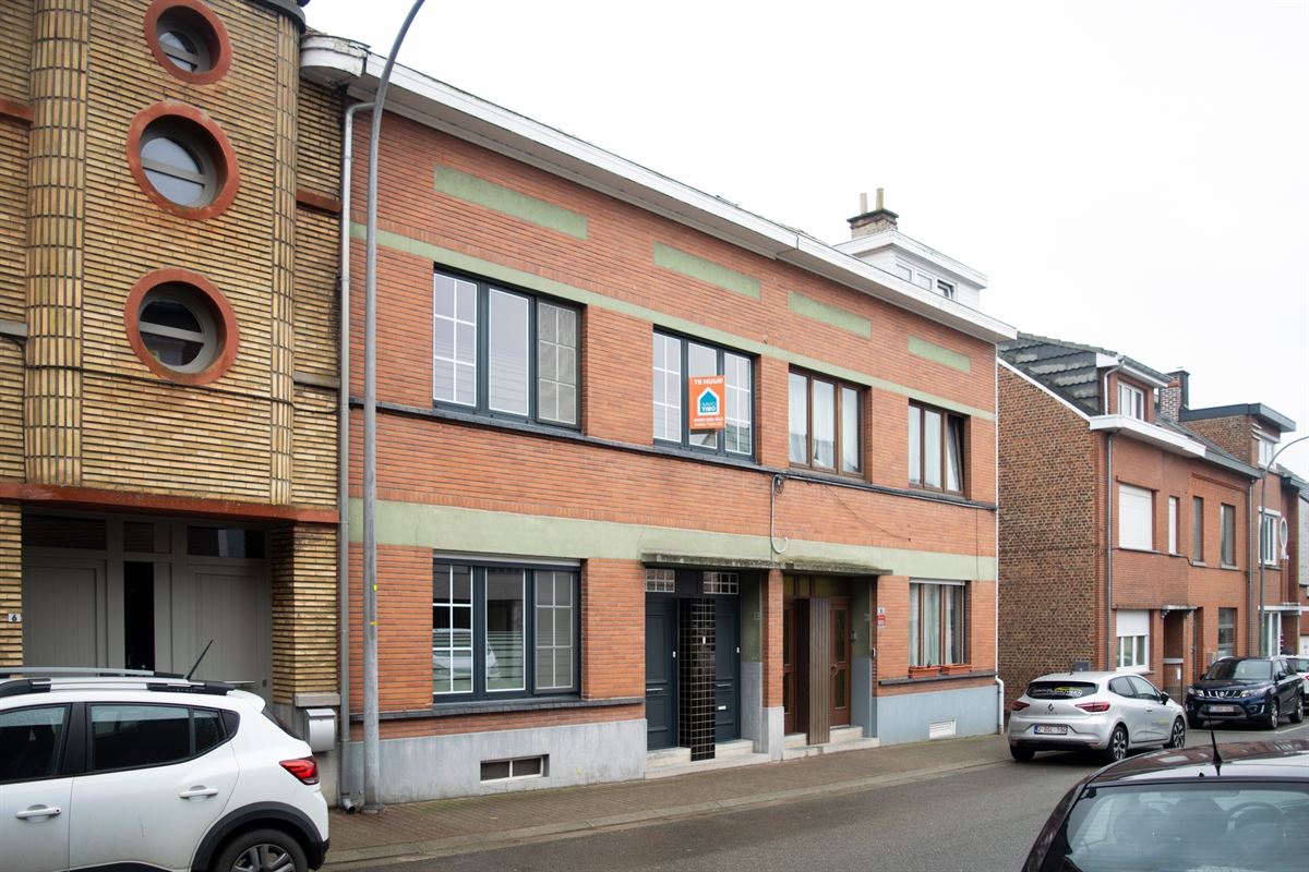 Huis met tuin, kelder en zolder
