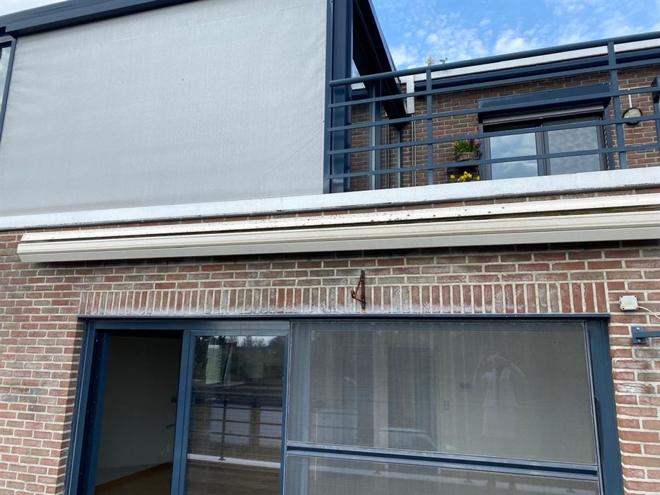 2 slpk-app met groot zonneterras en berging 1 en garagebox 2