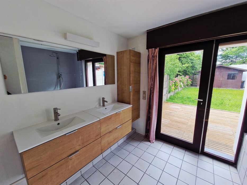 GOED GELEGEN KNUSSE WONING MET TUIN