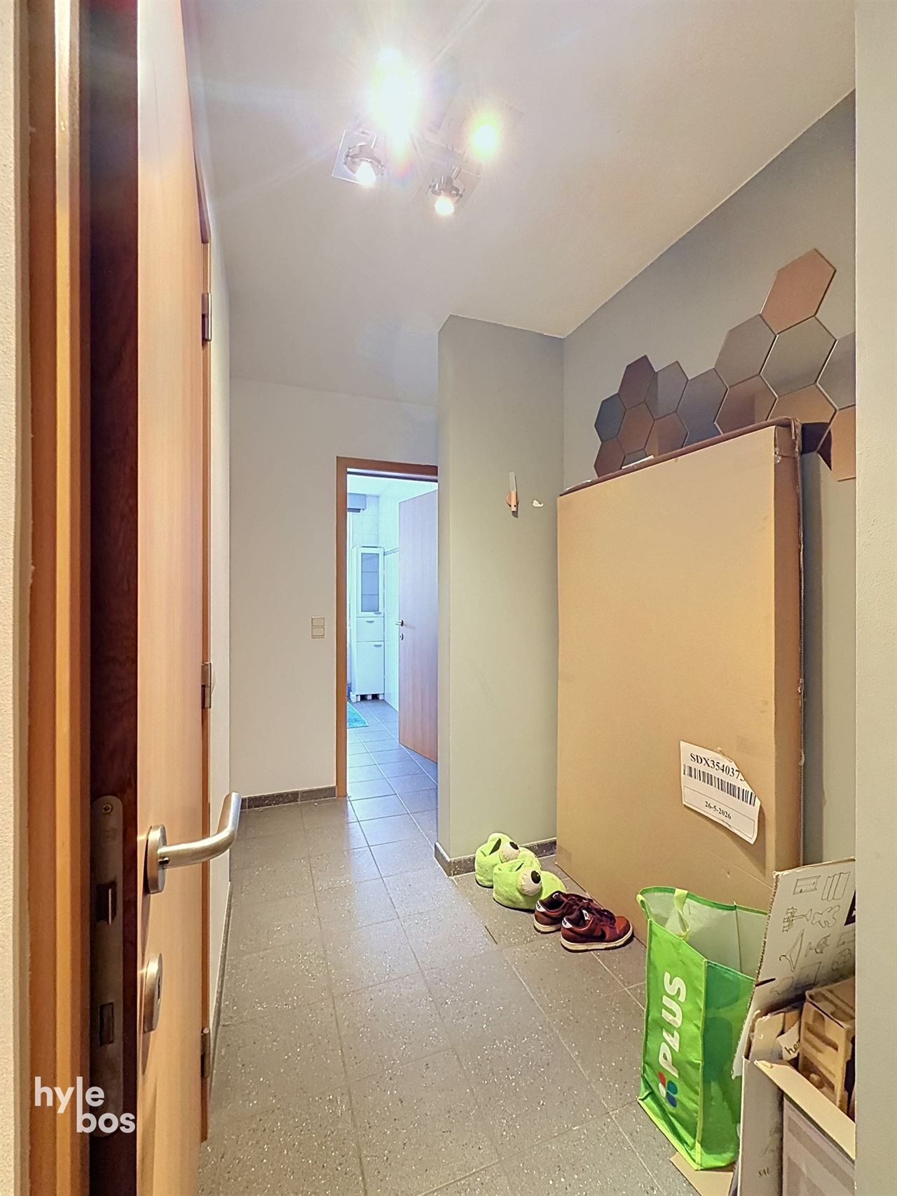 Gelijkvloers appartement met één slaapkamer en garage