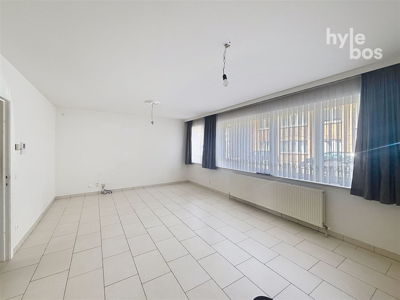 Gelijkvloers 3 slaapkamer appartement met tuin en garage