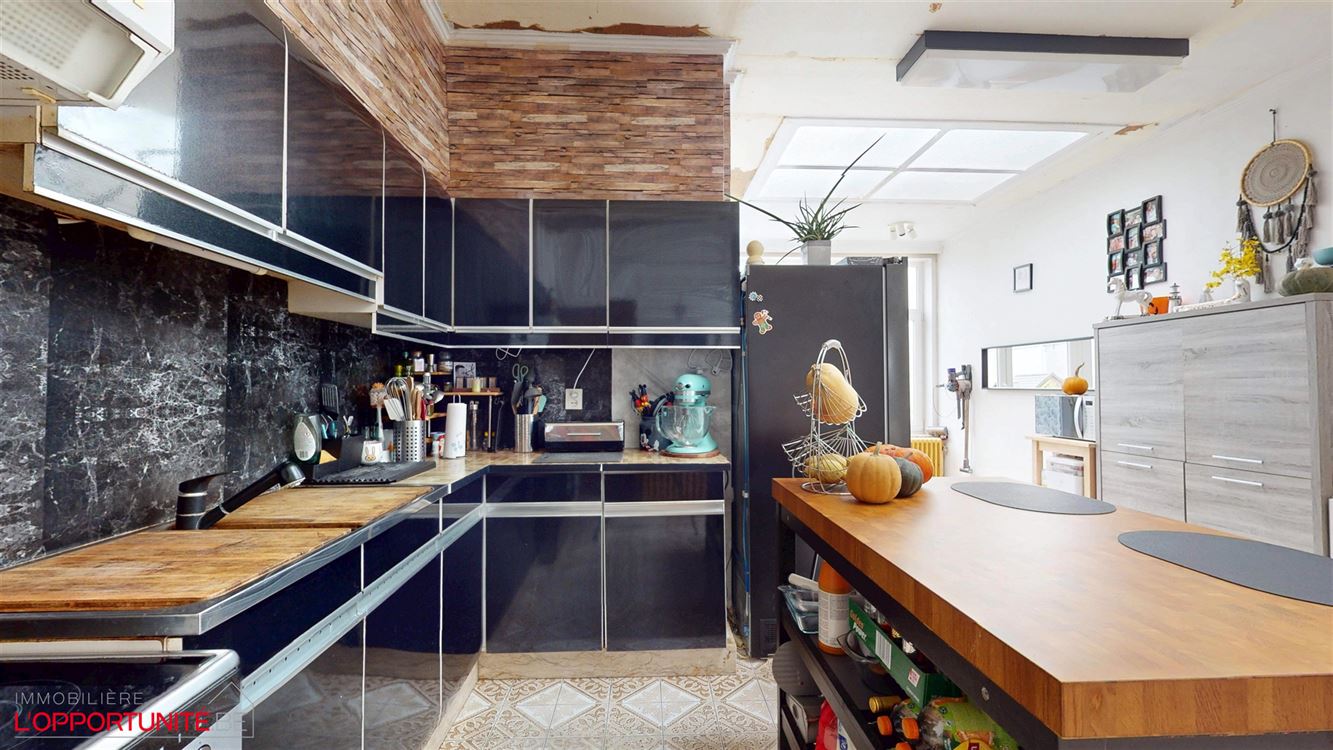 Magnifique maison deux chambres, grenier amenageable, terrasse et beau jardin.