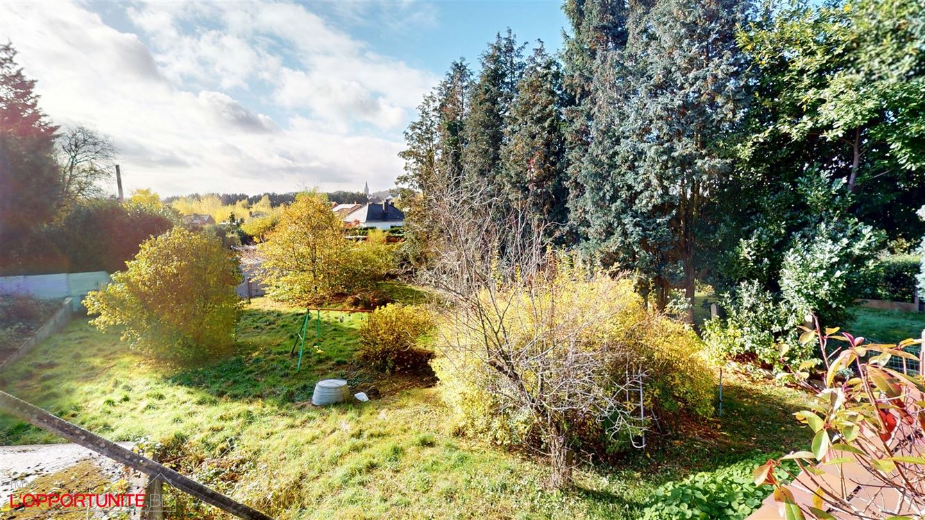 Belle maison 4 facades en bel étage inversé, deux chambres, magnifique jardin.