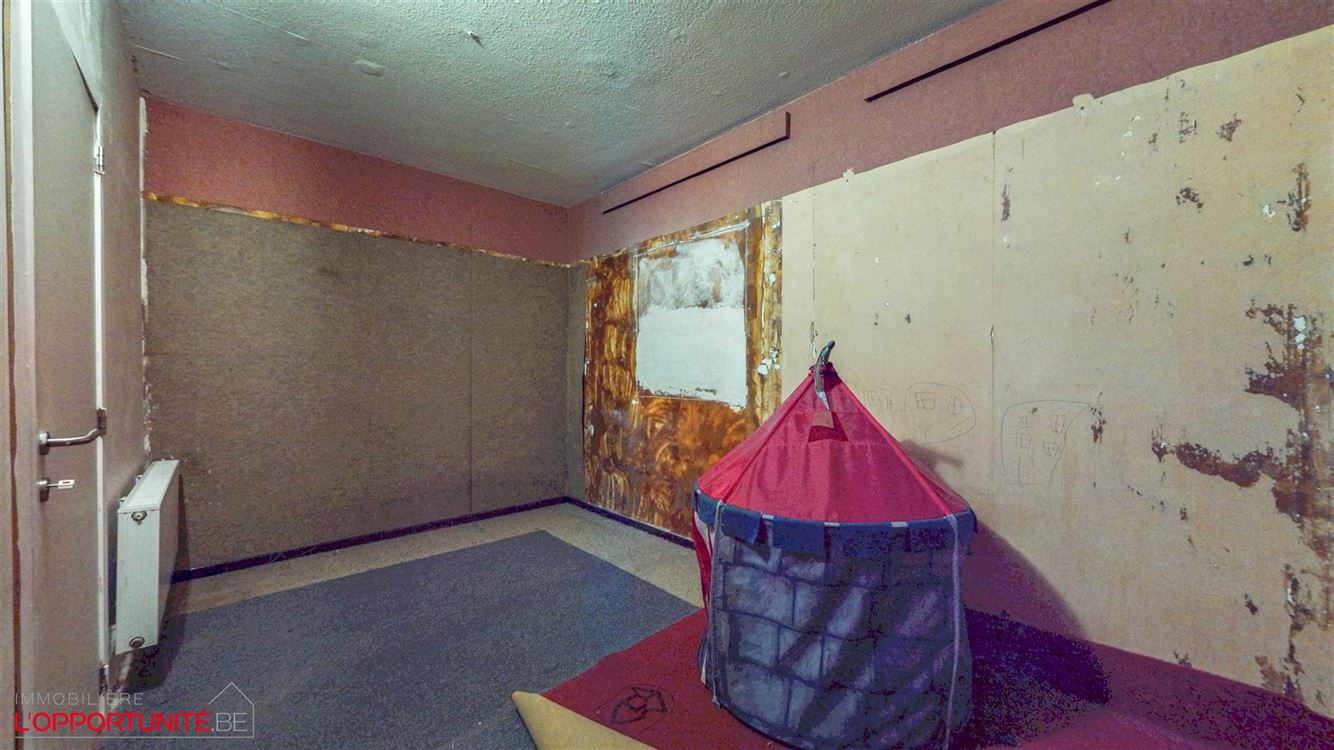 Rez- de- chaussée commercial et appartement