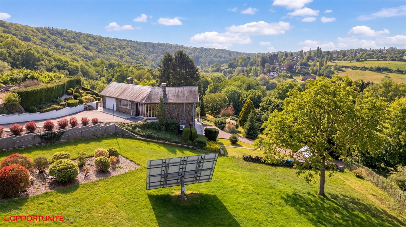 Propriété exceptionnelle sur 35 ares de terrain, 4 chambres, garages et carport.