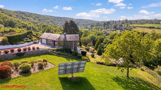 Propriété exceptionnelle sur 35 ares de terrain, 4 chambres, garages et carport.
