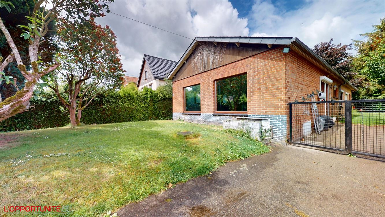 Rare plain pied 5 chambres, magnifique quartier résidentiel, garage et terrain de +/- 10 ares.