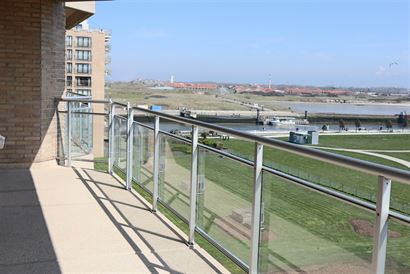 TE HUUR OP JAARBASIS - ongemeubeld appartement - zicht op de havengeul en het nieuw aangelegde Faberplein - zongerichte living met terras - ruime woon...