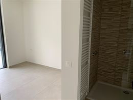 TE HUUR OP JAARBASIS - Ongemeubeld nieuwbouw hoekappartement met 2 slaapkamers - ruime terrassen (46 m²) - appartement is volledig geschilderd en ins...
