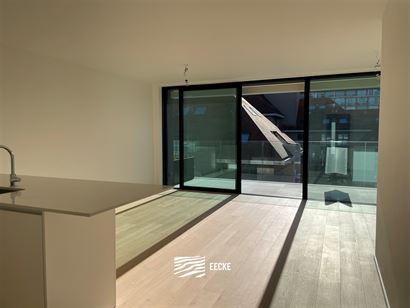 TE HUUR OP JAARBASIS - ongemeubeld nieuwbouw appartement met 2 slaapkamers - ruim terras - living met open keuken - overal vloerverwarming op gas - 2 ...