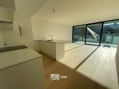 TE HUUR OP JAARBASIS - ongemeubeld nieuwbouw appartement met 2 slaapkamers - ruim terras - living met open keuken - overal vloerverwarming op gas - 2 ...