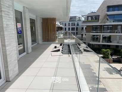 TE HUUR OP JAARBASIS - Ongemeubeld appartement in nieuwe residentie - groot zonneterras met zicht op het zwembad - woonkamer met open keuken - 2 slaap...