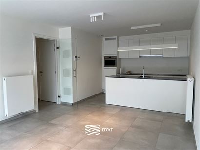 TE HUUR OP JAARBASIS - Ongemeubeld appartement in nieuwe residentie - groot zonneterras met zicht op het zwembad - woonkamer met open keuken - 2 slaap...