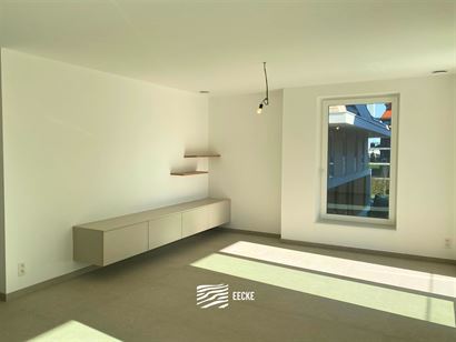 TE HUUR OP JAARBASIS - Ongemeubeld appartement in nieuwe residentie - ruim terras met zicht op het zwembad - appartement is volledig geschilderd en in...