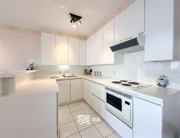 Panorama D1 F0202 - Zonnig appartement met twee slaapkamers - Gelegen op de tweede verdieping, uitgevend op de Elisalaan - Inkomhal met gastentoilet -...