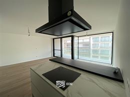 TE HUUR OP JAARBASIS - Ongemeubeld appartement in nieuwe residentie - middelgroot terras - woonkamer met open keuken - 2 slaapkamers met ingebouwde ka...