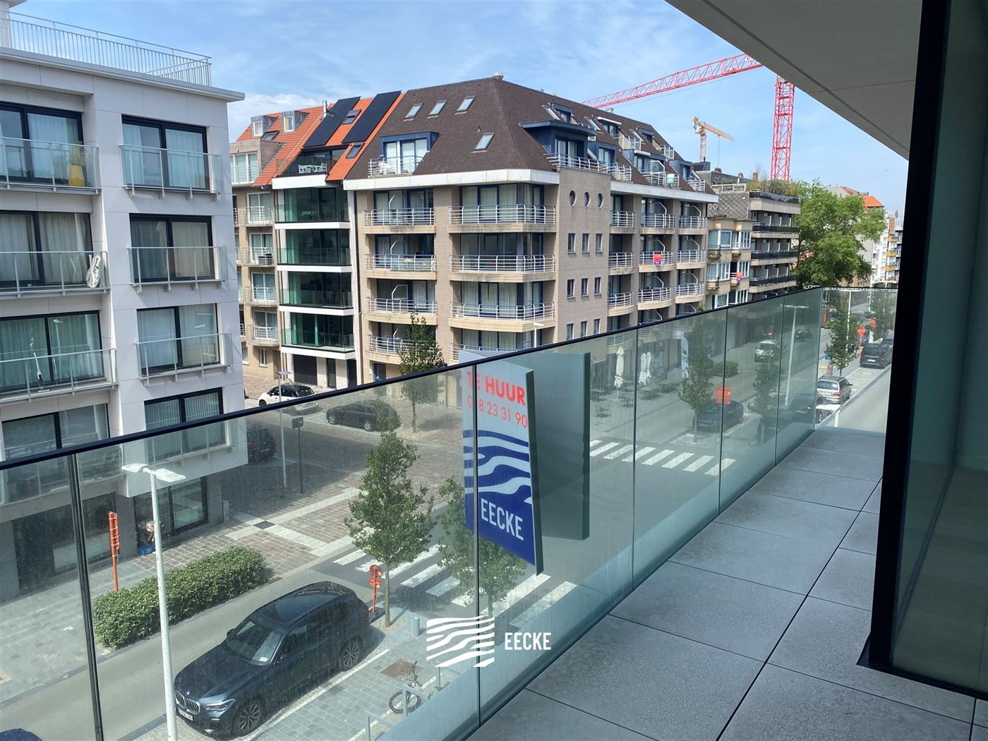 TE HUUR OP JAARBASIS - Ongemeubeld appartement in nieuwe residentie - middelgroot terras - woonkamer met open keuken - 2 slaapkamers met ingebouwde ka...
