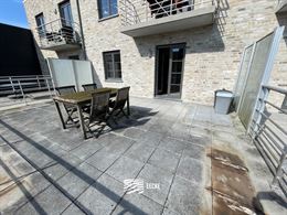 À LOUER SUR UNE BASE ANNUELLE - Appartement non-meublé avec terrasse ensoleillée à l'arrière - Dans la ville de Nieuwpoort - Living avec cuisine ...