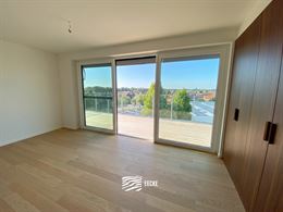 TE HUUR OP JAARBASIS - Ongemeubeld appartement in nieuwe residentie - Grote terrassen rondom rond - Appartement is volledig geschilderd en instapklaar...
