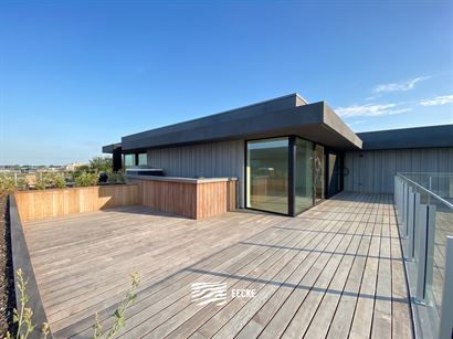TE HUUR OP JAARBASIS - Ongemeubeld appartement in nieuwe residentie - Grote terrassen rondom rond - Appartement is volledig geschilderd en instapklaar...