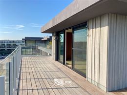 TE HUUR OP JAARBASIS - Ongemeubeld appartement in nieuwe residentie - Grote terrassen rondom rond - Appartement is volledig geschilderd en instapklaar...