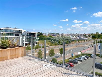 TE HUUR OP JAARBASIS - Ongemeubeld appartement in nieuwe residentie - Grote terrassen rondom rond - Appartement is volledig geschilderd en instapklaar...