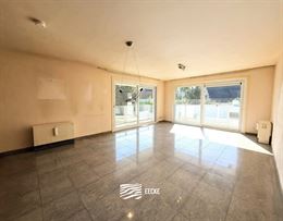 Res. Delvaux B 0104 - Zonnig hoekappartement op de eerste verdieping - Gelegen op wandelafstand van de Havengeul - Inkomhal met toilet en vestiaire - ...