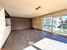 Res. Delvaux B 0104 - Zonnig hoekappartement op de eerste verdieping - Gelegen op wandelafstand van de Havengeul - Inkomhal met toilet en vestiaire - ...