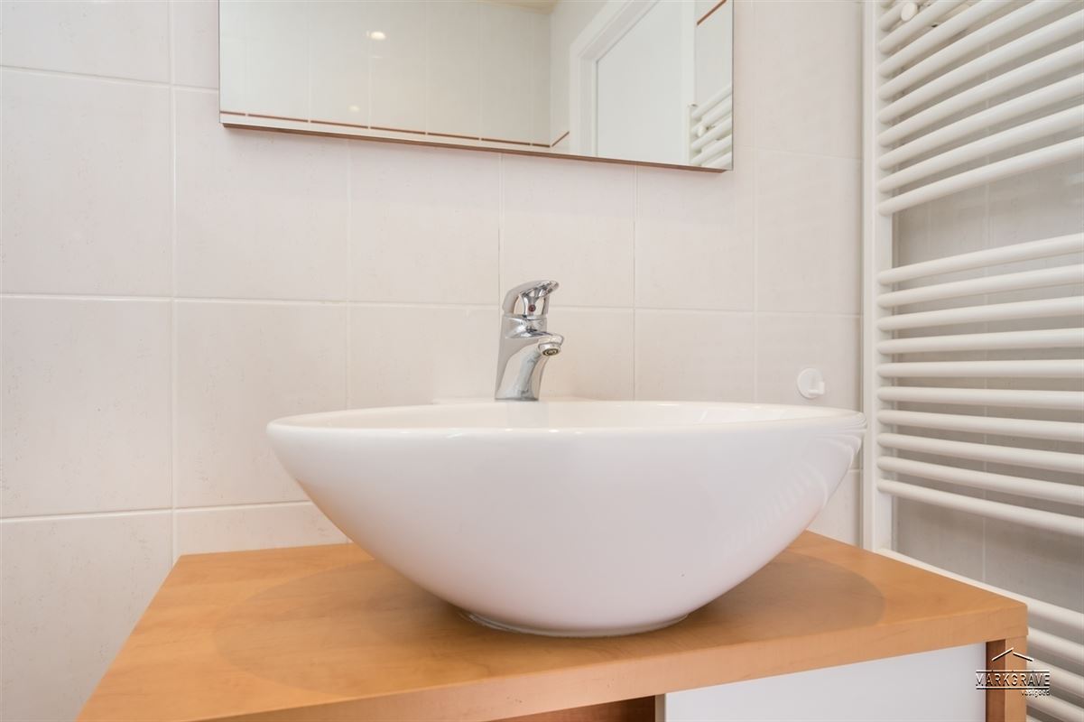 Gelijkvloers appartement met 1 slp en ondergrondse parking