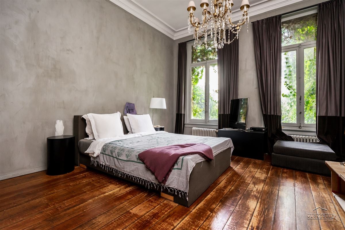 Herenhuis met stadstuin dakterras & parking