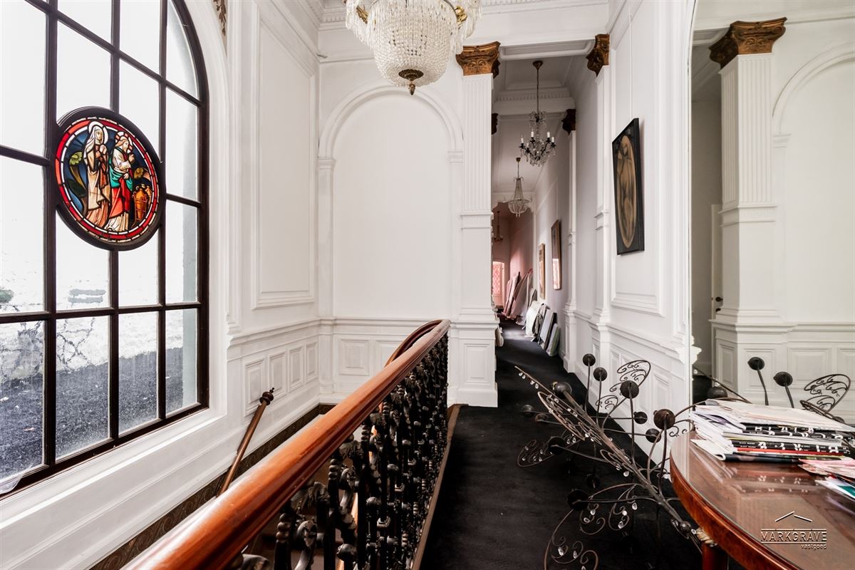 Herenhuis met stadstuin dakterras & parking