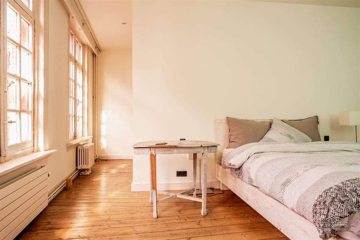 Herenhuis met stadstuin dakterras & parking