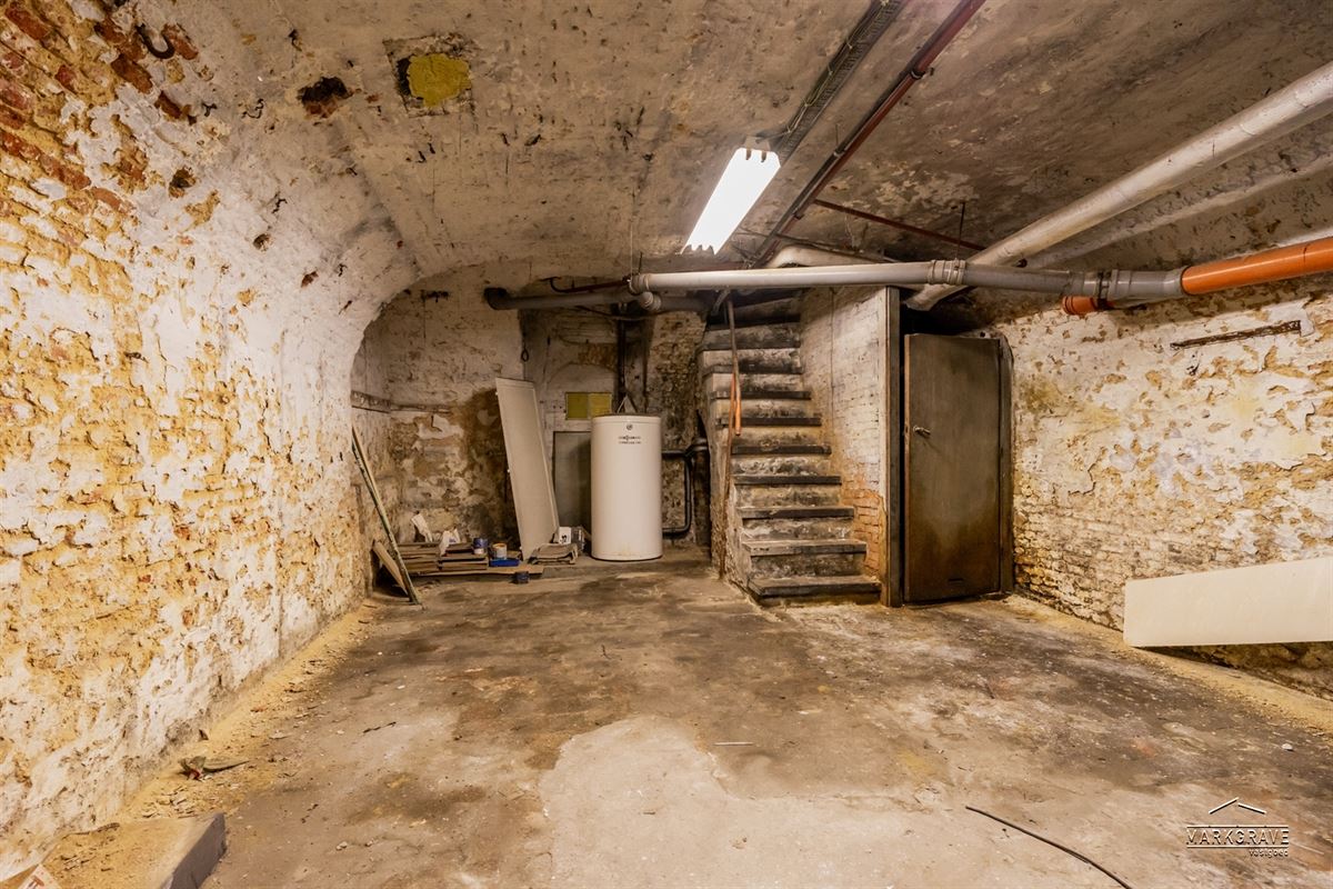 Authentiek 16e-eeuws Stadshuis in het Historisch Hart van de Stad