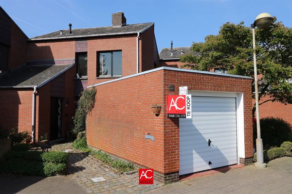 Welgelegen woning met garage en tuin