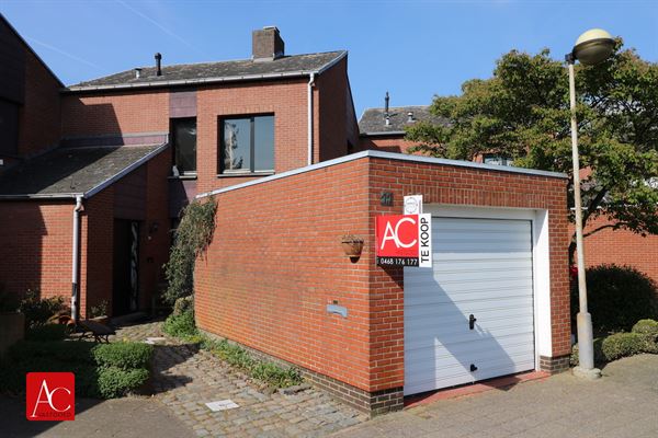 Welgelegen woning met garage en tuin