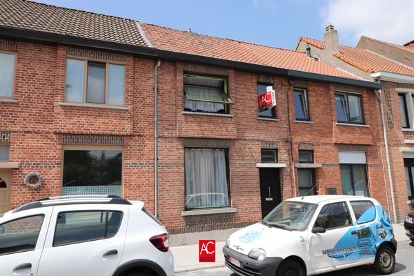 Gezinswoning met tuin en achteruitweg