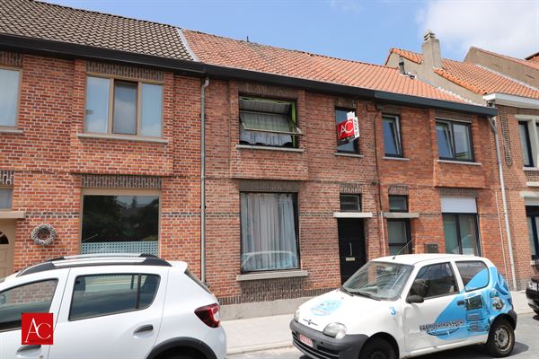 Gezinswoning met tuin en achteruitweg