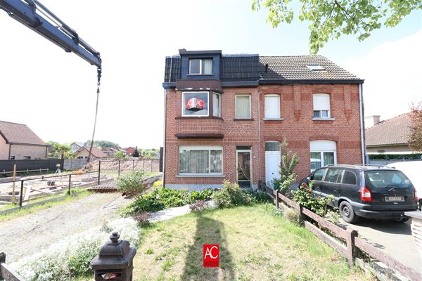 Te renoveren woning met garage, tuin, 3 slpks en gunstige ligging te Bornem!