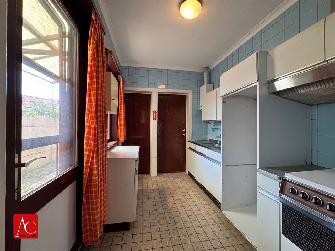 Goed gelegen woning met tuin ter renovatie