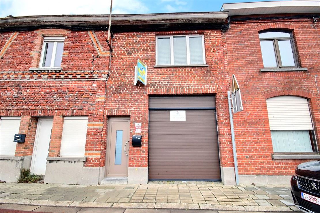 Maison avec jardin et grand garage située en bordure de Luingne, secteur très recherché