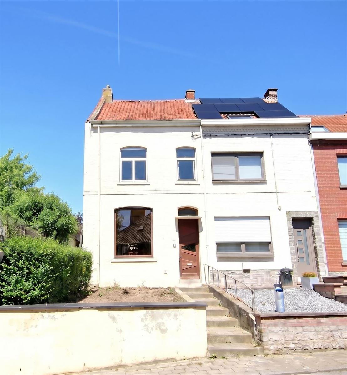 Maison familiale 3 chambres avec grand jardin et grenier aménageable Beau potentiel à Mouscron
