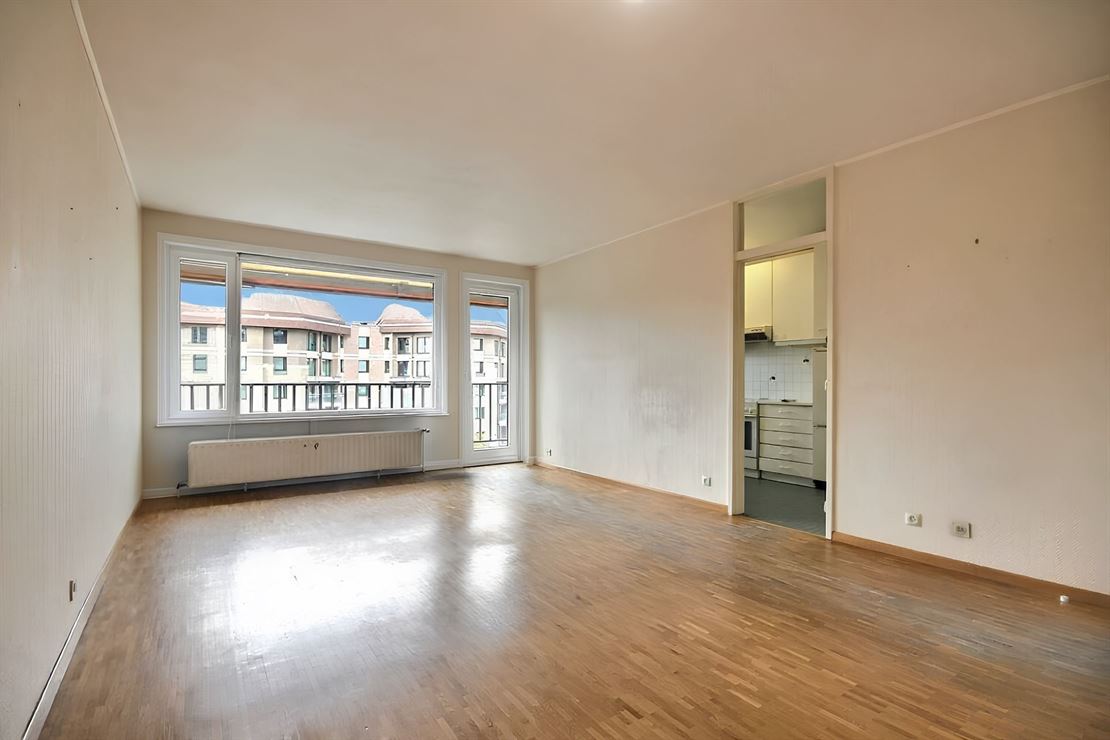 Appartement deux chambres et garage à rafraichir en plein centre-ville
