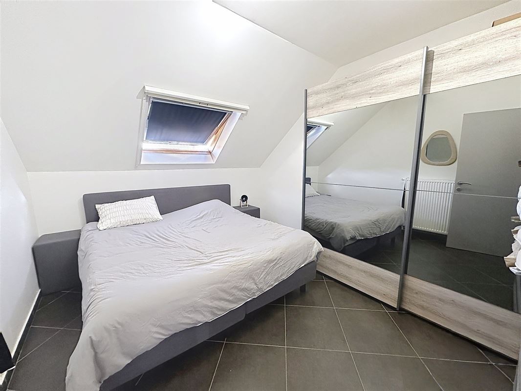 Instapklaar 2-slaapkamerappartement met terras vlakbij de Grote Markt.