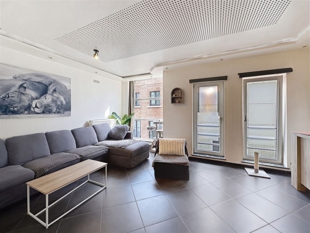 Instapklaar 2-slaapkamerappartement met terras vlakbij de Grote Markt.